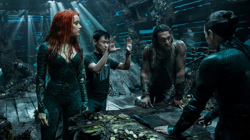 Wan directs Momoa, Amber Heard and Willem Dafoe in Aquaman.